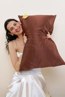 Brown Tuscan Rose silk pillowcase by Not Just Pajama, showcasing smooth, luxurious fabric with elegant stitched edges.