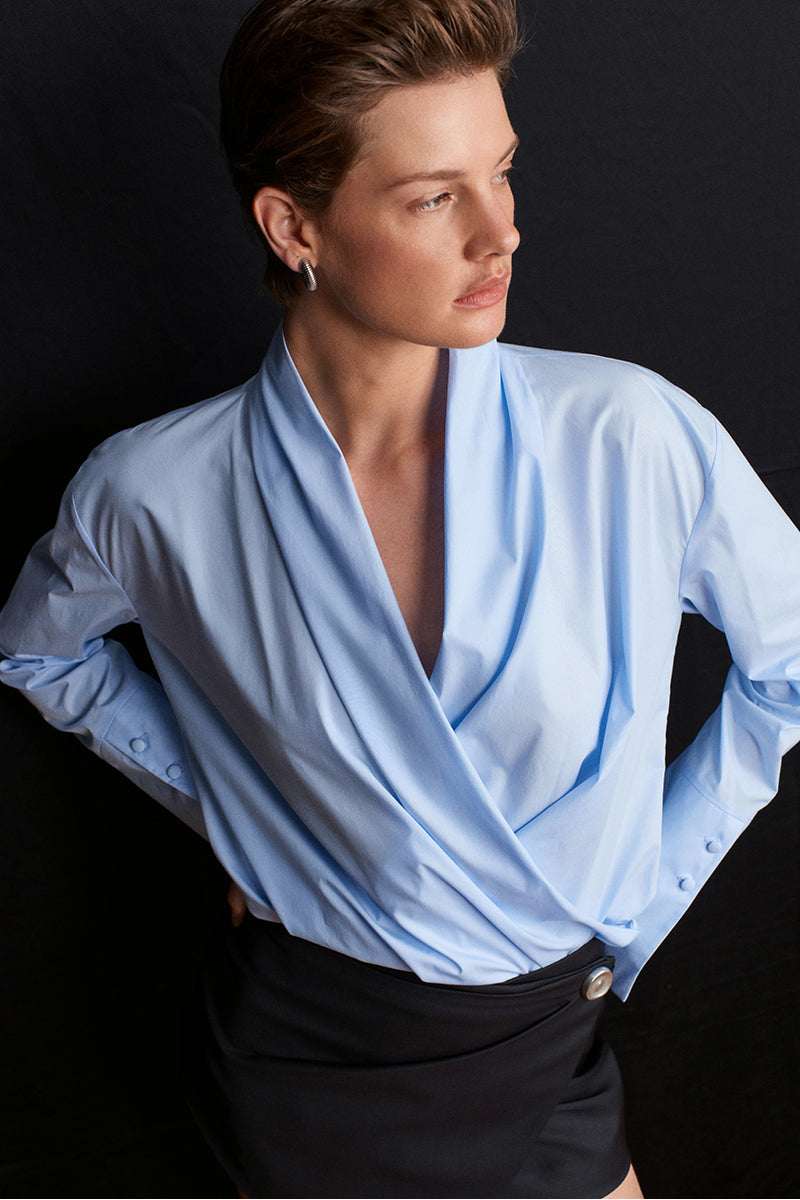 Blue historical shirt by Acaria Studio featuring classic design, button-up front, and vintage-inspired fabric details.