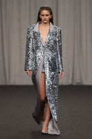 Lili Blanc sequin longline coat with shimmering fabric, tailored fit, and classic collar, perfect for elegant winter wear.