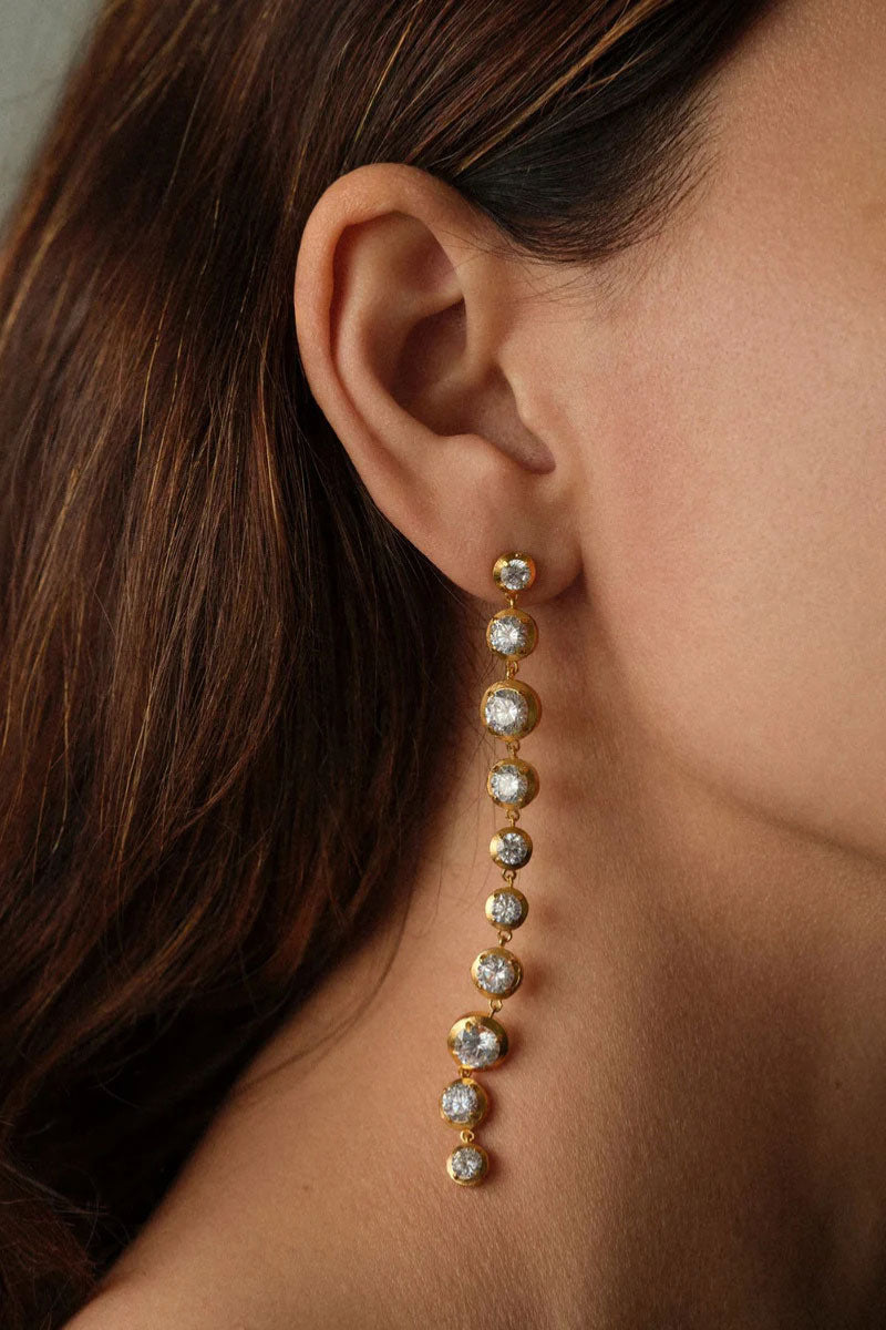 Peracas Bella earrings in white, stylish dangle earrings with sleek design and polished finish, perfect for elegant accessories.