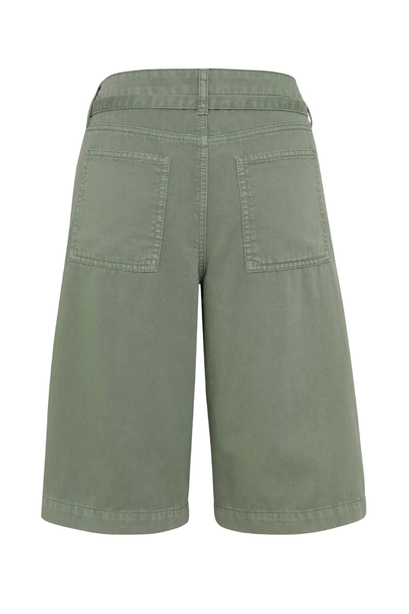 TT Studios Pam Short in Greene Street, green casual shorts with a relaxed fit, displayed on a model against a neutral background.