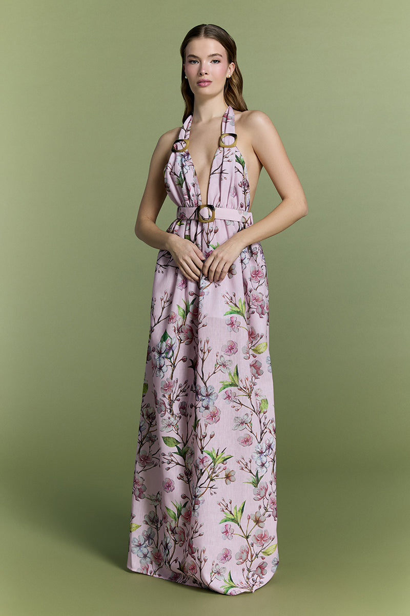 Nur Karaata Coastal Glow Maxi Dress featuring a flowing silhouette and ocean-inspired design perfect for summer occasions.