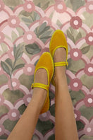 Yellow Flabelus Ebenezer flats showing smooth leather finish and classic slip-on design.