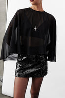 Black MARDE sequin mini skirt by Nazlı Ceren with shiny, eye-catching sequins and a fitted waistband.