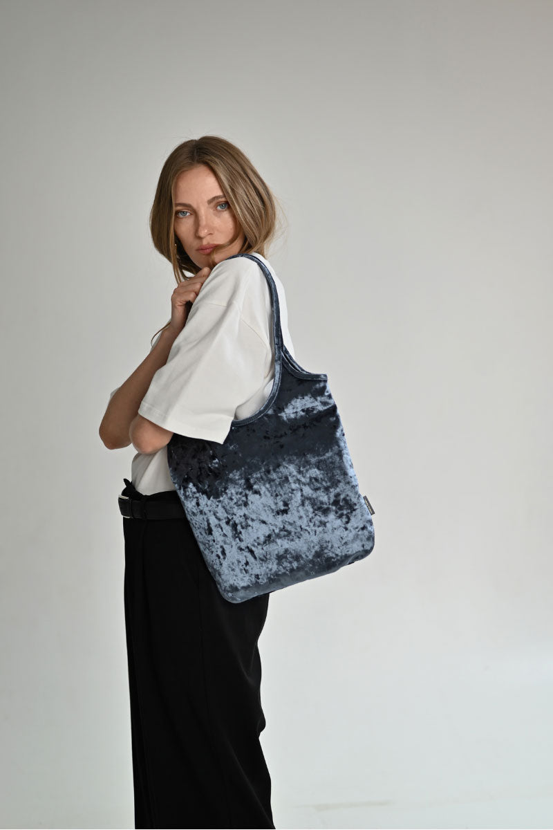 Gray VIKELE STUDIO GIGI shoulder bag with sleek design and adjustable strap, shown with open flap and interior compartments.