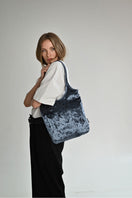 Gray VIKELE STUDIO GIGI shoulder bag with sleek design and adjustable strap, shown with open flap and interior compartments.