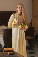 Brown silk custom gown robe by Not Just Pajama, featuring smooth fabric and a relaxed fit, displayed on a neutral background.
