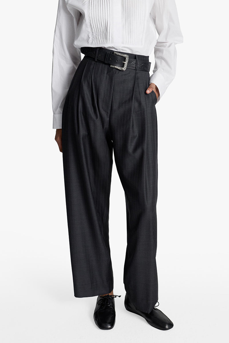 Dark gray striped Jasmin pants by Acaria Studio, featuring a relaxed fit and comfortable fabric with subtle stripe details.