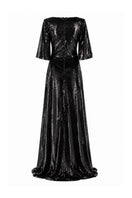 Lili Blanc Glow Gown displayed on a hanger, featuring elegant fabric and a flowing silhouette, perfect for formal occasions.
