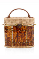 Waiwai Rio Copan Turtle top handle bag in woven material with turtle design, featuring a structured shape and top handle for stylish carrying.