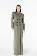 Lili Blanc Luxe Coat displayed on a hanger, showcasing its elegant design and tailored fit in a neutral color.