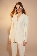 Nazlı Ceren Marylebone crepe flared trousers in vanilla ice, stylish pants with a flattering fit and elegant flare.