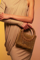 Silvia Gnecchi LA LUNA GOLD shoulder bag with a sleek gold finish, featuring a structured design and top handle.