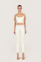 Monika Dimova gold thread-embroidered tweed top featuring intricate gold embroidery on a stylish tweed fabric.