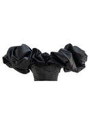 Black lace-up corset top with meringue flounces from Monetre, featuring intricate lace details and ruffled hem.