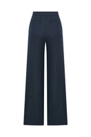 Nazlı Ceren Millie linen trousers in dark navy, featuring a relaxed fit and lightweight fabric, shown on a model.