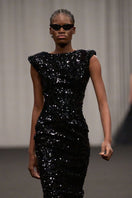 Lili Blanc sculpted sequin gown with fitted silhouette, showcasing shimmering sequins and elegant design on a formal evening dress.