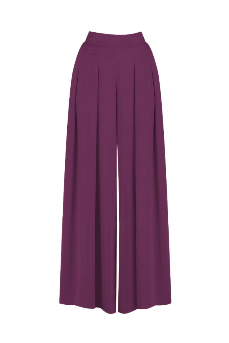 MASTANI Sufia aubergine pants featuring a relaxed fit and stylish design, shown hanging on a clothing rack.