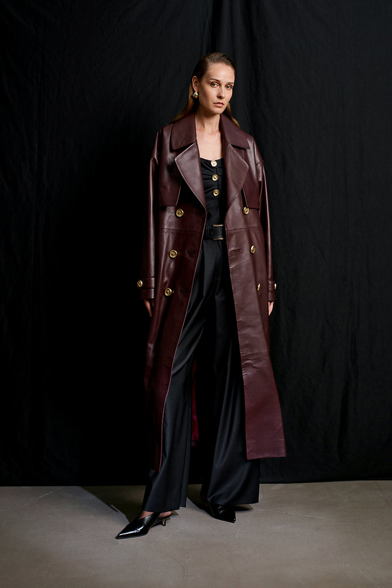 Acaria Studio Journey Leather Trench Coat in Cherry, featuring a stylish leather design and classic trench silhouette.