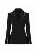 Lili Blanc Edge Blazer, tailored blazer with sharp lapels and structured fit, displayed on a mannequin.