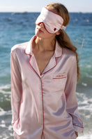 Pink Little Heart Eye Mask in loungewear by Not Just Pajama, featuring a soft fabric with heart patterns for relaxing rest.