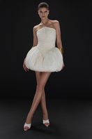 BalYKINA Clara Ivory Mini Dress shown on a model, featuring a stylish and elegant design perfect for casual or semi-formal occasions.