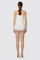 White feathered underwear pants by Balykina, featuring soft fabric and decorative feather details for a stylish look.