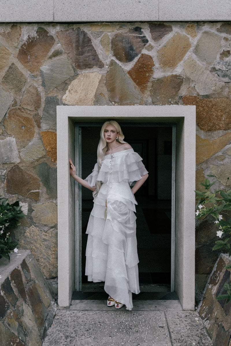 White Plan Thomas maxi dress, flowing sleeveless design with a fitted waist and elegant floor-length silhouette.