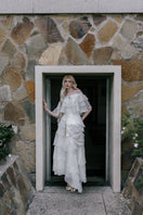 White Plan Thomas dress maxi dress with a flowing design and elegant style, shown on a model in a full-length shot.