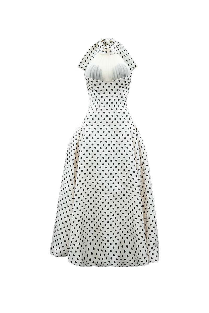 Elegant Do Long Timeless Loop Gown in flowing fabric, featuring a classic loop design and subtle detailing.