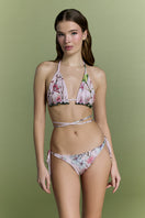 Nur Karaata Sunset Palms bikini featuring a colorful palm print, with a stylish two-piece design and tropical-inspired pattern.
