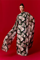 Nur Karaata Marianne maxi dress featuring a flowy fabric, floral pattern, and sleeveless design perfect for summer wear.