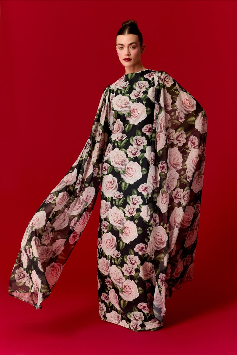 Nur Karaata Marianne maxi dress featuring a flowy fabric, floral pattern, and sleeveless design perfect for summer wear.