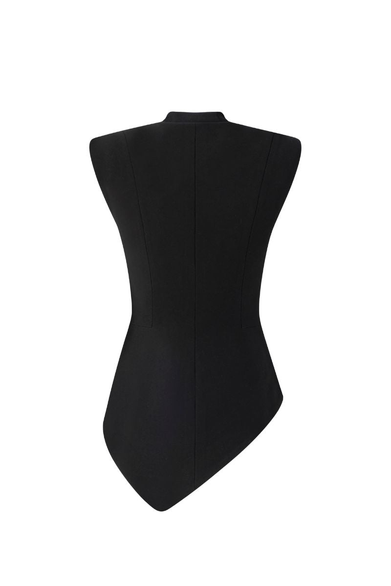 Asymmetric sleeveless blazer and feather skirt co-ord set by Tracy Studio, featuring stylish design and feather details.