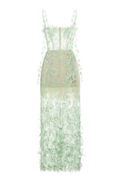 Montsand mint beaded lace pencil gown featuring intricate beaded lace details and a fitted silhouette.