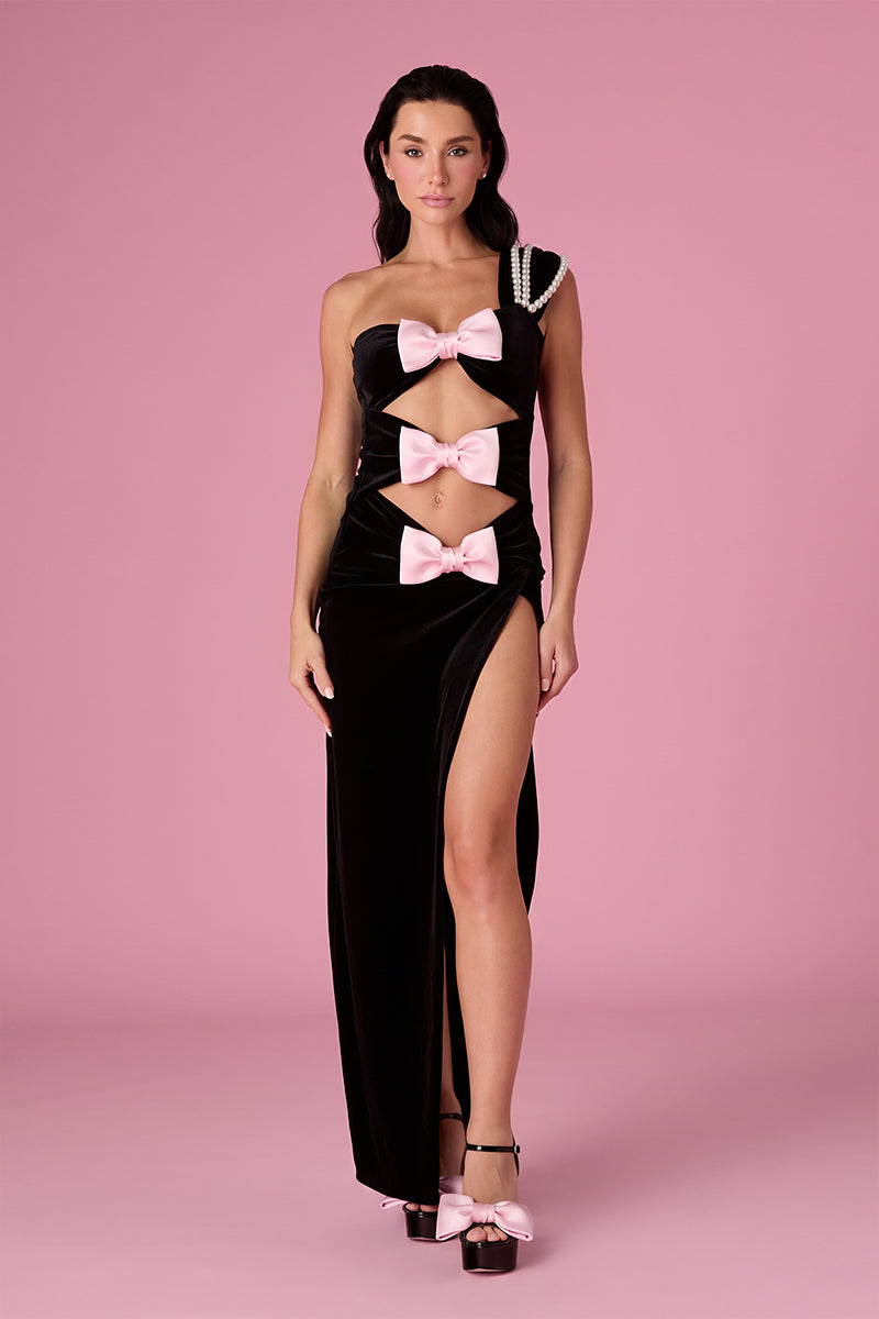Nur Karaata Midnight Muse gown featuring elegant black fabric and stylish design, perfect for formal occasions.