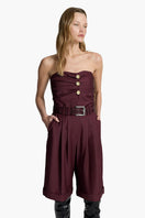 Acaria Studio red wine shorts with a relaxed fit, made from lightweight fabric, displayed on a neutral background.