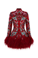 Le Thanh Hoa Ruby Blossom Dress, a vibrant red mini dress with floral details, displayed on a hanger against a neutral background.