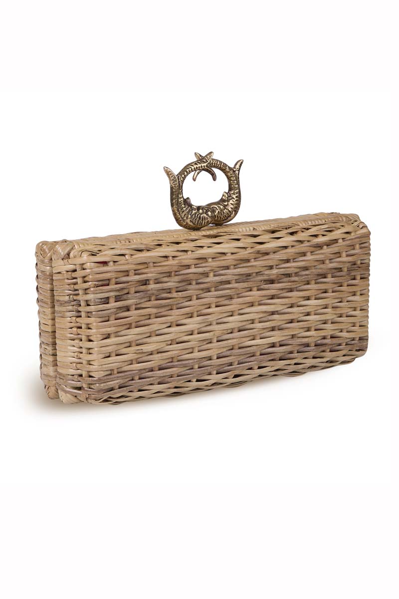 Waiwai Rio rattan sardine clutch bag with woven texture, compact design, and rounded shape on a neutral background.