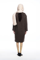 Chictopia faux fur hood scarf showing soft, plush beige fur with attached hood for cozy winter style.