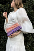 Touchless CULT MIA X top handle handbag with purple and pink pleated ombre design, featuring a sleek, stylish look.