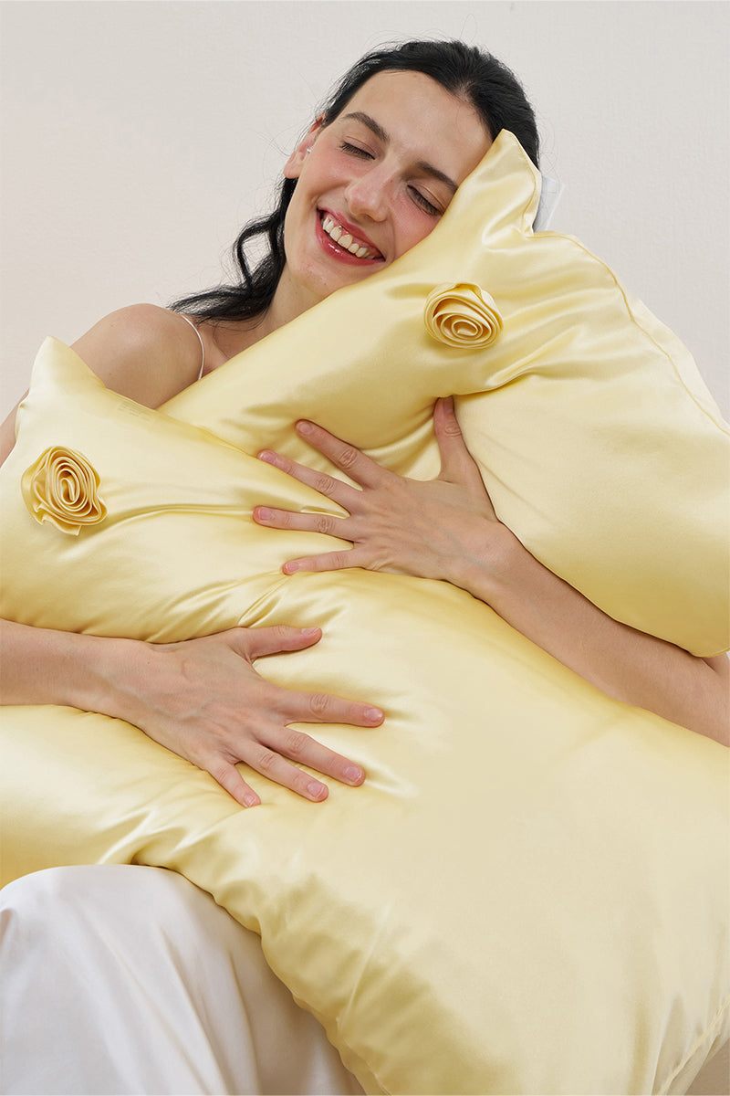 Yellow Tuscan Rose silk pillowcase from Not Just Pajama, showcasing smooth fabric and elegant design for luxurious home decor.
