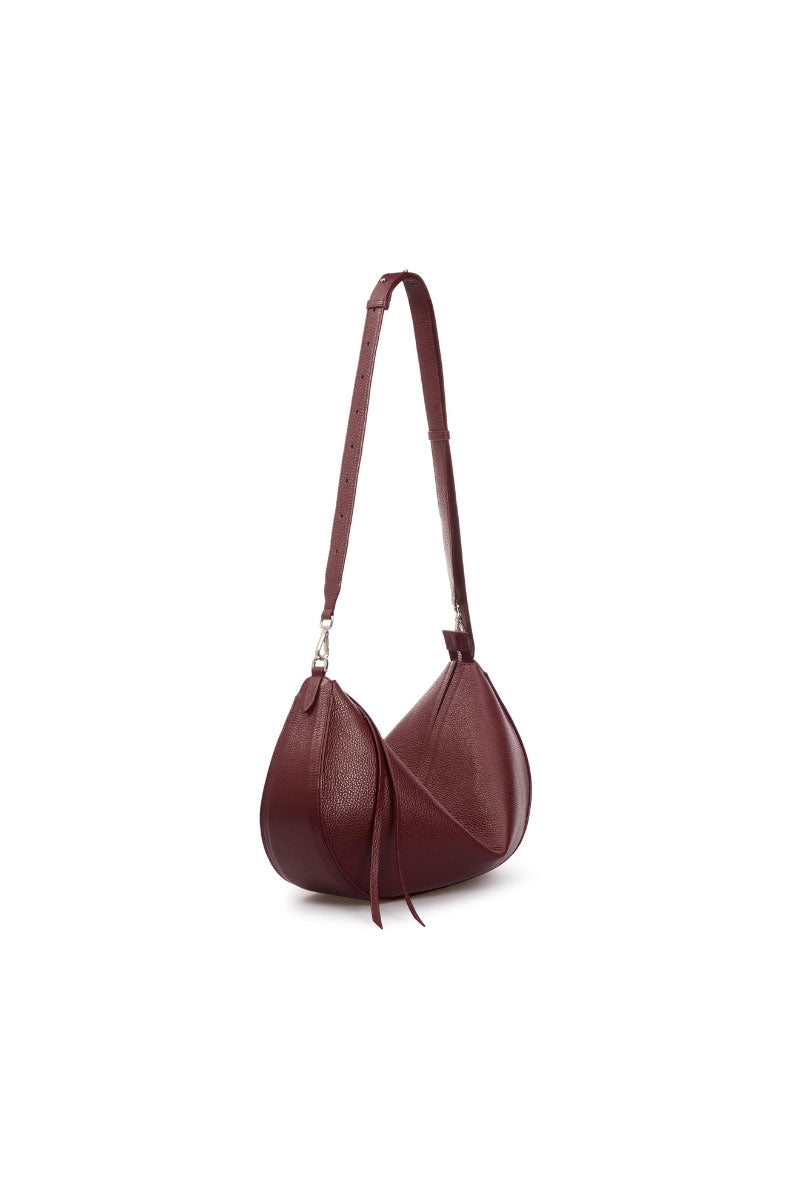Vikele Studio Denise shoulder bag in burgundy leather with adjustable strap and sleek design, perfect for stylish everyday use.