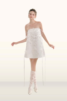 Arti Apparel Isabelle Mini Dress displayed on a hanger, featuring a stylish short dress with a fitted silhouette and ruffled sleeves.