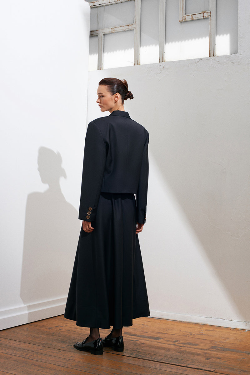 Black Guru Crop Blazer by Acaria Studio, tailored fit blazer with structured design, shown on a model.
