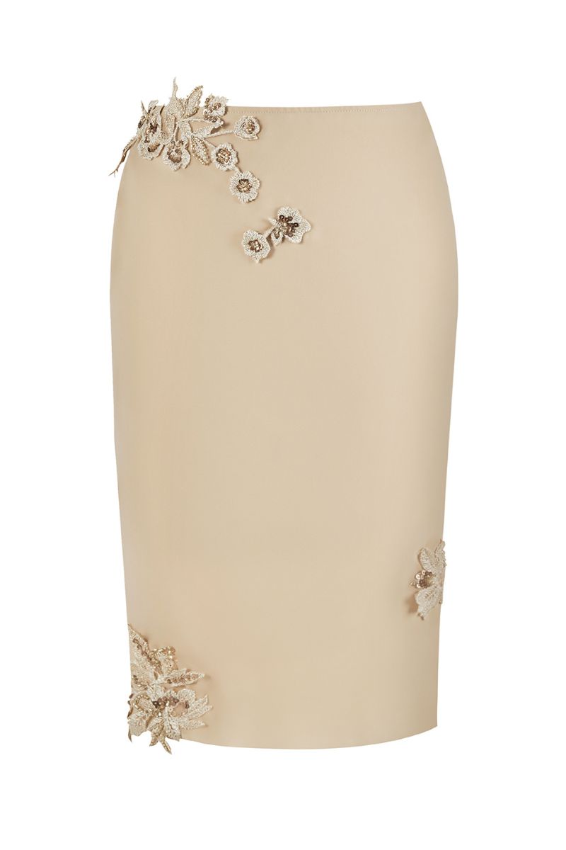 Cream Belle lace knee-length midi skirt by Stolen Stores, featuring intricate lace details and a flattering fit.