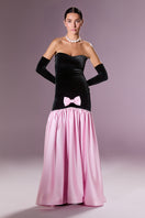 Nur Karaata Marcelline gown displayed on a model, featuring elegant fabric and detailed design for formal occasions.