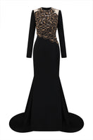 Black velvet satin floral embellished gown by Lune De Soie with intricate floral embroidery and elegant drape details.