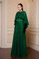 Elegant green A-line gown with a mullet cape by I.H.F, featuring flowing fabric and stylish layered design.