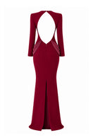 Lili Blanc crepe gown displayed on a hanger, featuring a flowing silhouette and elegant design in soft fabric.